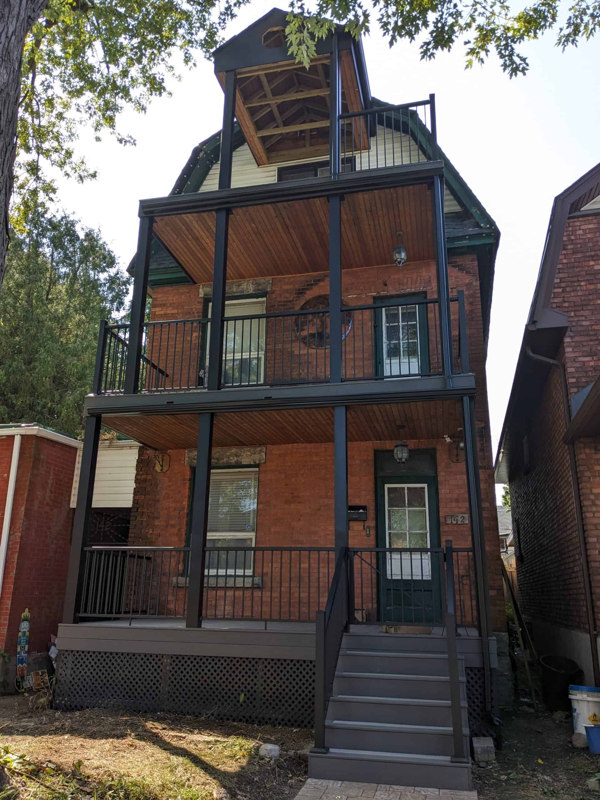 3 Story Composite Deck with Railing finished by Ottawa Deck Builders