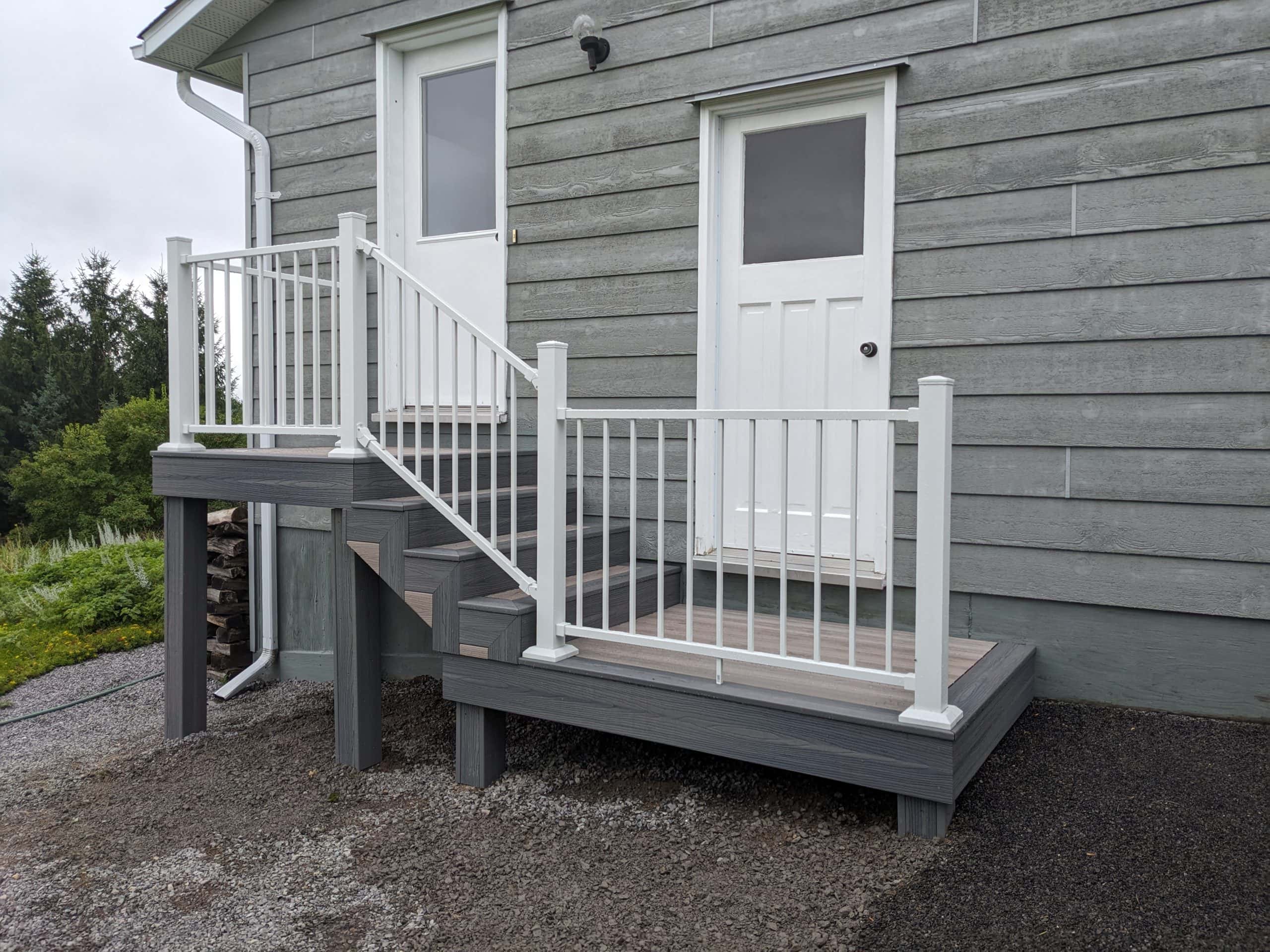 Beach House with white Railing by Ottawa Deck Builders