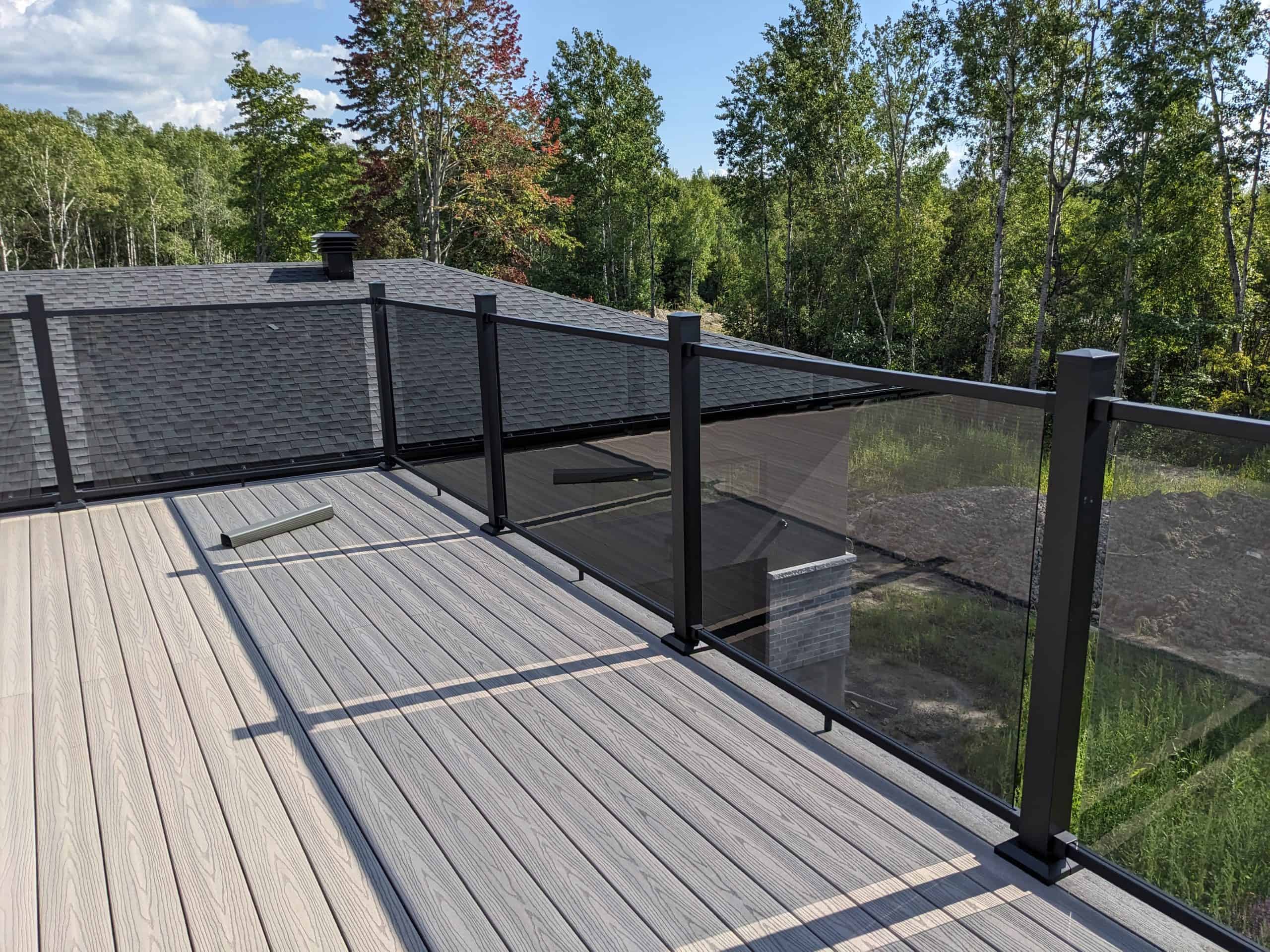 Rooftop Deck with Glass Rail by Ottawa Deck Builders