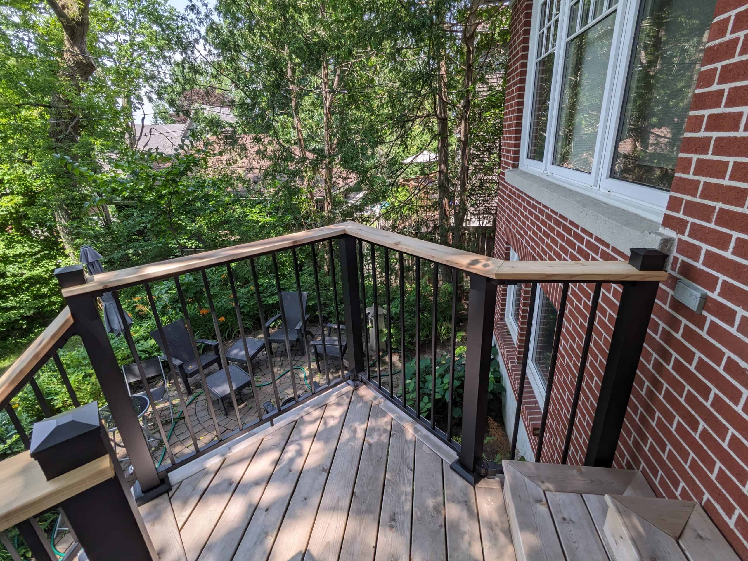 Fortress Black Railing with Cedar Drinkrail by Ottawa Deck Builders